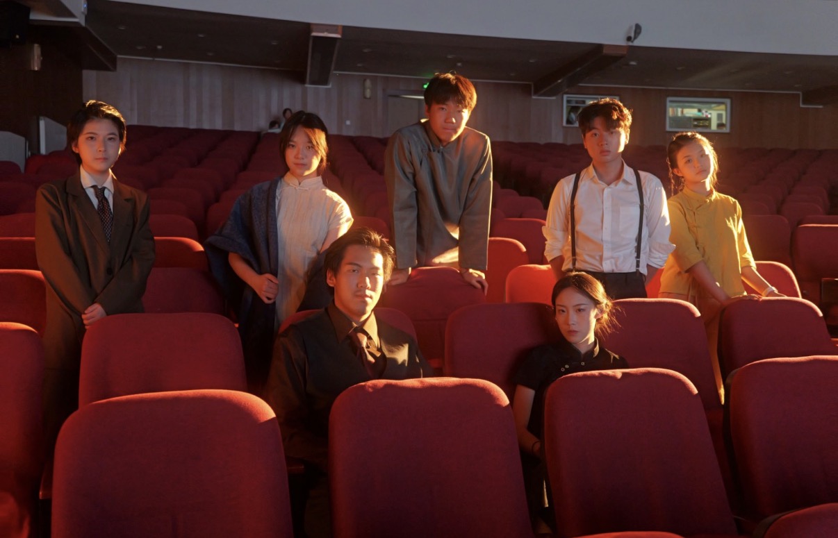 Classical society Theater cast in auditorium